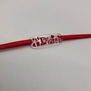 SOLD!! Dior Red Heart Lucite Ribbon Bracelet